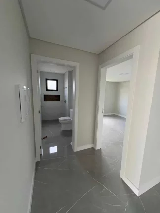Imagem Casa em condomínio com 4 dormitórios sendo 3 suítes e 4 vagas - Camboriú/SC