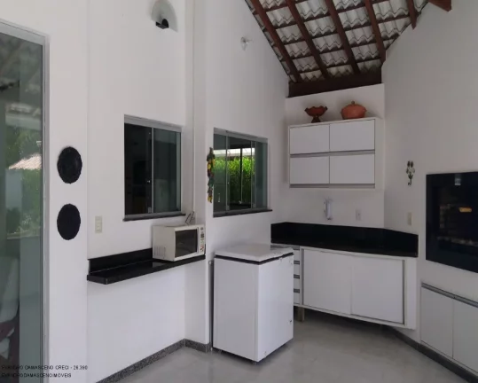 Imagem Casa de luxo em condomínio à venda em Busca Vida, Camaçari-BA: 4 quartos, 4 suítes, 2 salas, 2 banheiros, 4 vagas, 450m².