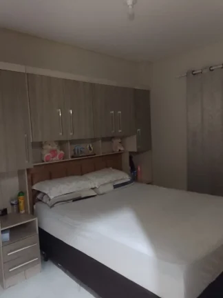 Imagem Terreno com 2 Sobrados, meio lote, com suíte