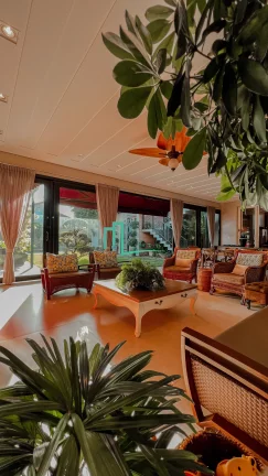 Imagem Magnifica casa com projeto arquitetônico diferenciado e exclusivo em um lote de esquina com 1.050 metros em um dos condominios mais valorizados e proc