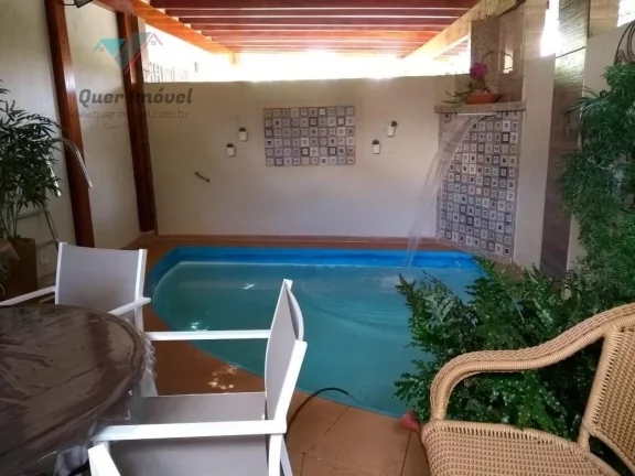 Imagem Luxuosa casa em condomínio à venda em Ribeirão Preto-SP, no bairro Ribeirânia. Condomínio Parque das Figueiras. 4 quartos, 4 suítes, 3 salas, 6 banheiros, 2 vagas de garagem. 320,00 m² de área. Imperdível com a Quer Imóvel Negócios Imobiliários.
