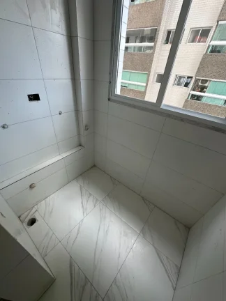 Imagem Apartamento à venda na Guilhermina, Praia Grande-SP: 1 quarto, 1 suíte, 1 sala, 2 banheiros, 51m² de área.