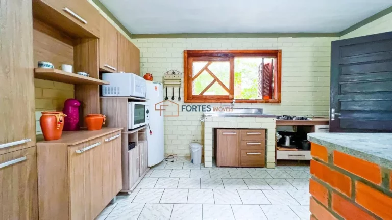 Imagem Fortes Imóveis vende Sobrado em Capão Novo