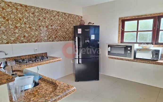 Imagem Belíssima casa de 7 quartos a venda no Bosque do Peró em Cabo Frio.