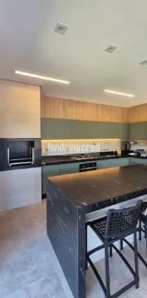 Imagem Sobrado de alto padrão em Cambé: 3 suítes, piscina aquecida, casa de visitas, pomar, energia solar e 3.000m² de terreno amplo