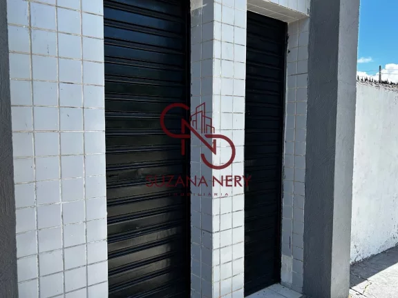 Imagem Prédio comercial com uma casa, 2 lojas e 11 kitinets