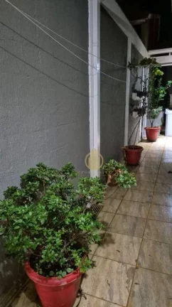 Imagem Casa com 3 dormitórios à venda, 160 m² por R$ 538.000,00 - Condomínio Cidade da Criança - Ribeirão Preto/SP