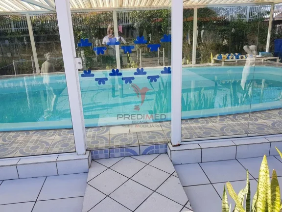 Imagem Lindo, muito lindo, situado a duas quadras da praia, 5 imóveis, com academia, piscina