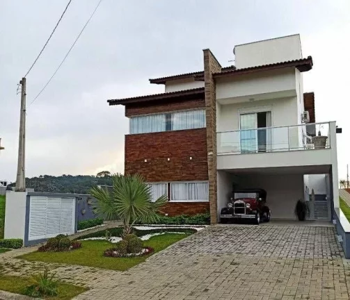 Imagem Casa com 3 dormitórios à venda, 260 m² por R$ 2.200.000,00 - Condomínio Aruã - Mogi das Cruzes/SP