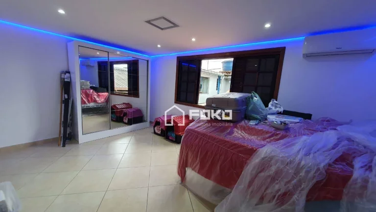 Imagem Sobrado com 4 dormitórios à venda por R$ 610.000,00 - Vila Rio de Janeiro - Guarulhos/SP