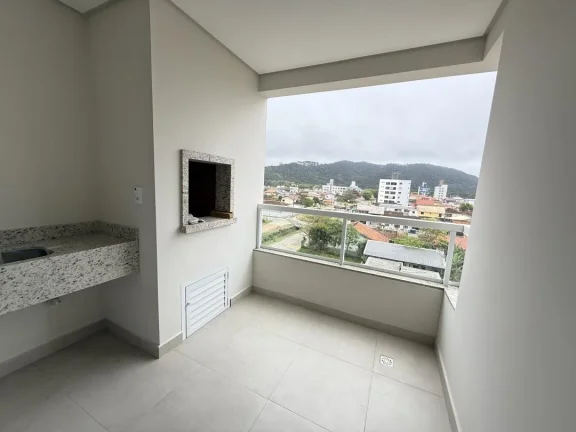 Imagem Apartamento 03 quartos, sendo 01 suíte novo e pronto para morar, na Praia de Gravatáa em Navegantes SC. Adriano Carpes Imóveis Vende