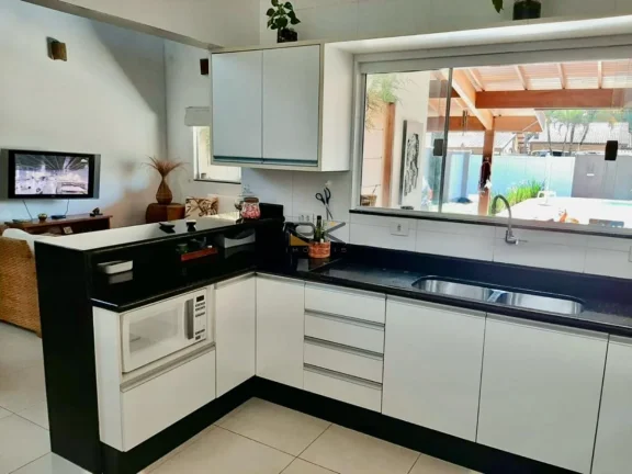 Imagem CASA A VENDA NAS TONINHAS COM 4 SUÍTES,SALA,COZINHA,2 VAGAS DE GARAGEM