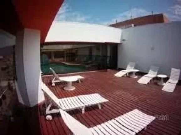 Imagem Flat com 2 dormitórios à venda, 65 m² - Pitangueiras - Guarujá/SP