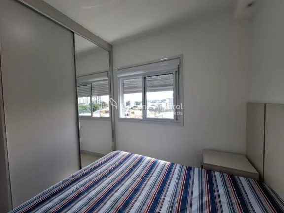 Imagem Apartamento moderno e aconchegante, situado em andar alto com vista para uma rua tranquila. Possui u...