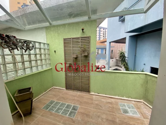 Imagem Sobrado com quintal, 3 dormitórios e garagem coberta à venda no bairro da Ponta da Praia em Santos R$ 1.065.000,00