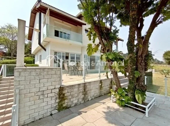 Imagem Casa luxuosa e moderna à venda em terreno de 1.270 m² com 600 m² de área construída, oferecendo...