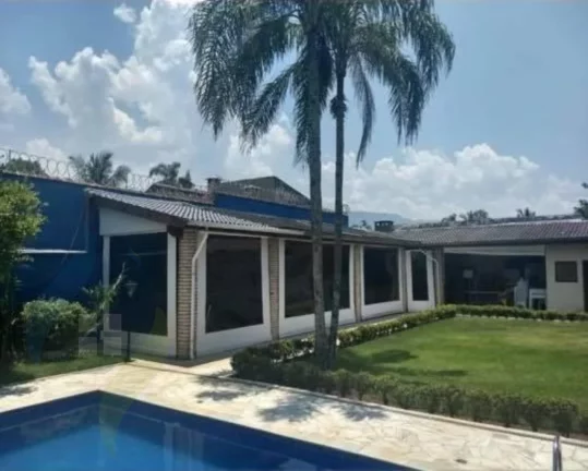 Imagem Casa de 7 dormitórios, 4 suíte, 6 banheiros e 2 vagas, com 327,695m² construída e 1.047,75m² total em Centervalle, Bertioga