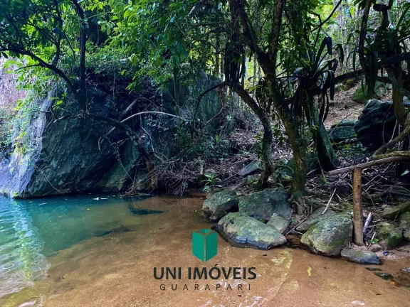 Imagem Chácara com 10 suítes e Cachoeira a venda, 9.104M² na zona rural de Guarapari.