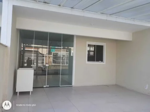 Imagem Geminado próximo ao mar com 3 dormitórios e 2 vagas de garagem em Balneário Piçarras