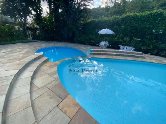 Imagem Belíssimo apartamento com 3 dormitórios na Praia da Enseada em Ubatuba - ao lado da praia, mais ou menos 50 metros do mar.