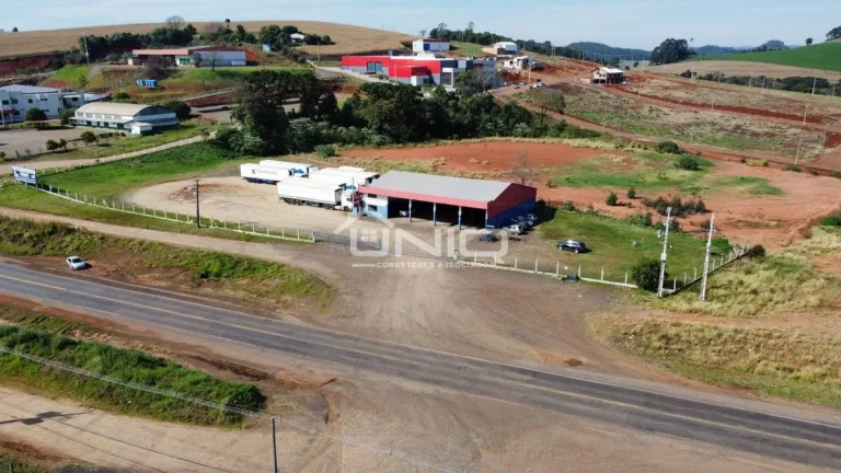 Imagem Terreno com Barracão Comercial Frente para BR