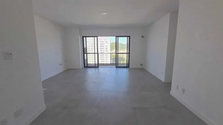 Imagem Apartamento vista mar com 3 suítes e 2 vagas de garagem na Praia Brava