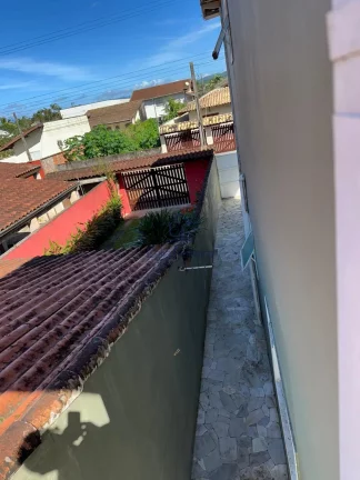 Imagem Casa com piscina à venda para seu refúgio no litoral Massaguaçu - Caraguatatuba/SP