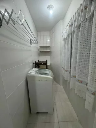 Imagem Apartamento com 2 dormitórios sendo 1 suíte e 1 vaga de garagem em Itapema/SC