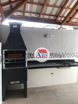 Imagem Sobrado com 2 dormitórios à venda, 80 m² por R$ 480.000,00 - Caiçara - Praia Grande/SP