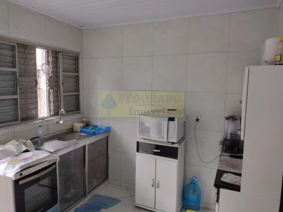 Imagem Imperdível oportunidade de adquirir casa comercial de 2 quartos, 2 salas, 2 banheiros e 5 vagas de garagem em Caraguatatuba-SP.