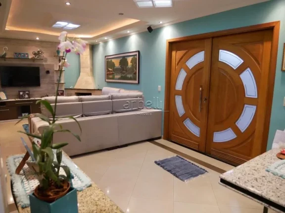 Imagem Sobrado com 170 metros quadrados de área construída, ampla sala com lareira e teto rebaixado com s...