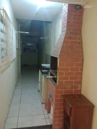 Imagem Casa com 3 dormitórios à venda, 78 m² por R$ 440.000,00 - Aviação - Praia Grande/SP