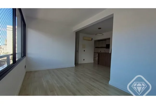 Imagem Apartamento desocupado e ensolarado com orientação leste e norte, oferecendo 64 metros quadrados d...