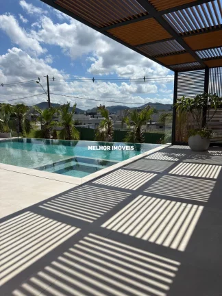 Imagem Casa alto padrão mobiliada finamente decorada com 5 suítes 6 vagas balneário Camboriú.