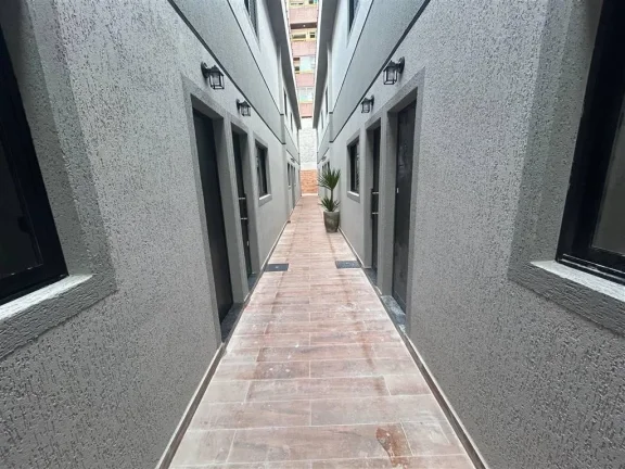 Imagem Casa para Venda em Praia Grande, Caiçara, 2 dormitórios, 1 banheiro, 1 vaga
