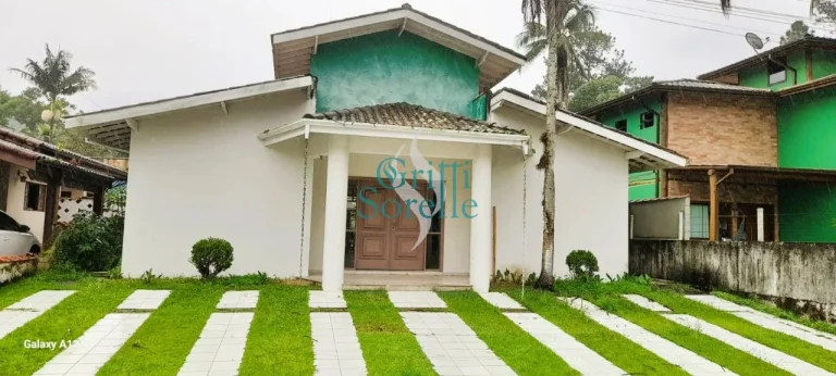 Casa em Condomínio à Venda em Horto Florestal - Ubatuba/SP.