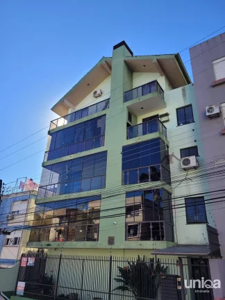 Apto tipo kitnet semi mobiliado com box garagem para venda em Santa Maria