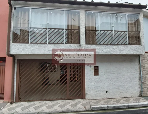 Imagem Vendo lindo sobrado em valor de Oportunidade, com 3 dormitórios sendo 1 suíte, eescritório, 2 vagas, sacada envidraçada e Jardim de inverno.