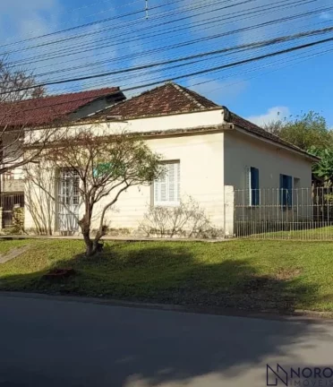 Terreno com Casa à Venda no Bairro Nossa Senhora das Dores na Av. Oswaldo Cruz.