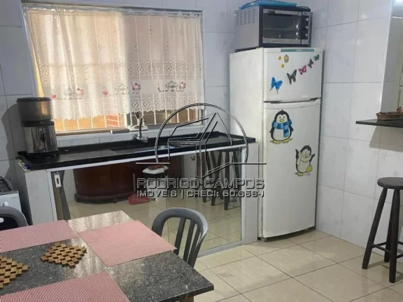 Imagem Espaçosa Casa Geminada à Venda no Tupiry, Praia Grande - 3 Quartos