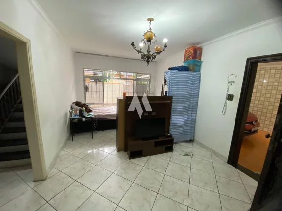 Imagem Sobrado com 4 dormitórios à venda em Santos/SP
