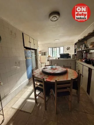 Imagem Casa com 4 dormitórios à venda - 347 m² por R$ 1.100.000 - Vila Matias - Santos/SP