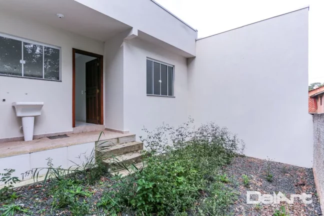 Imagem Casa térrea (geminada) - R$ 259.000,00 - Novinha - 61,02m2 - Bairro Bom Jesus/Rio Negro-Pr.