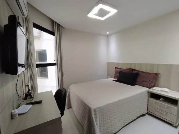Imagem Excelente Apartamento de Frente para o Mar na Praia do Morro composto por 4 dormitório sendo 3 suítes, com 2 vagas de garagem.