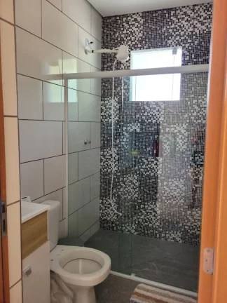 Imagem Sobrado, 300 m² - venda por R$ 1.150.000,00 ou aluguel por R$ 4.850,00/mês - Massaguaçu - Caraguatatuba/SP