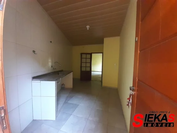 Imagem Aluguel de Casa na Penha de França - 2 quartos, 1 banheiro, 1 vaga de garagem e 50m² - São Paulo-SP