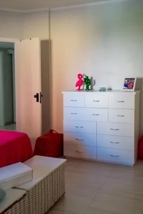 Imagem Flat com 3 dormitórios à venda, 112 m² por R$ 700.000,00 - Pitangueiras - Guarujá/SP