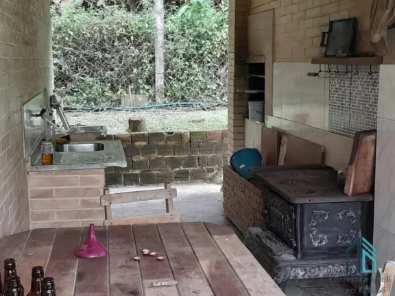 Imagem Chácara contendo tanque de peixes, 02 casas, internet, em condomínio - Morretes PR