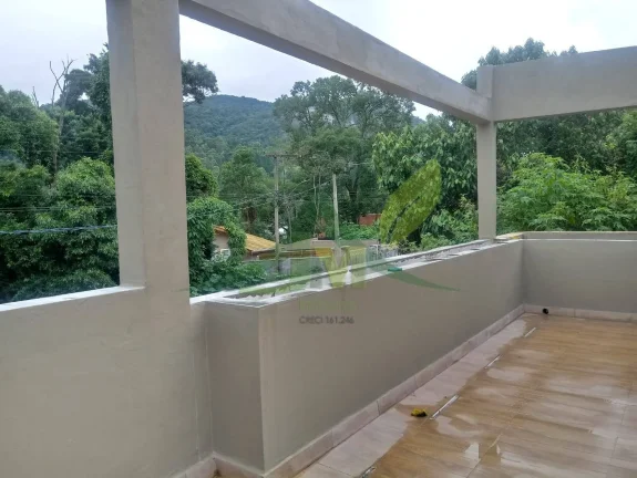 Imagem Bela Casa casa em Terra Preta com área comercial à venda