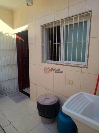 Imagem Sobrado com 2 dormitórios à venda, 79 m² por R$ 318.000 - Oceanópolis - Mongaguá/SP